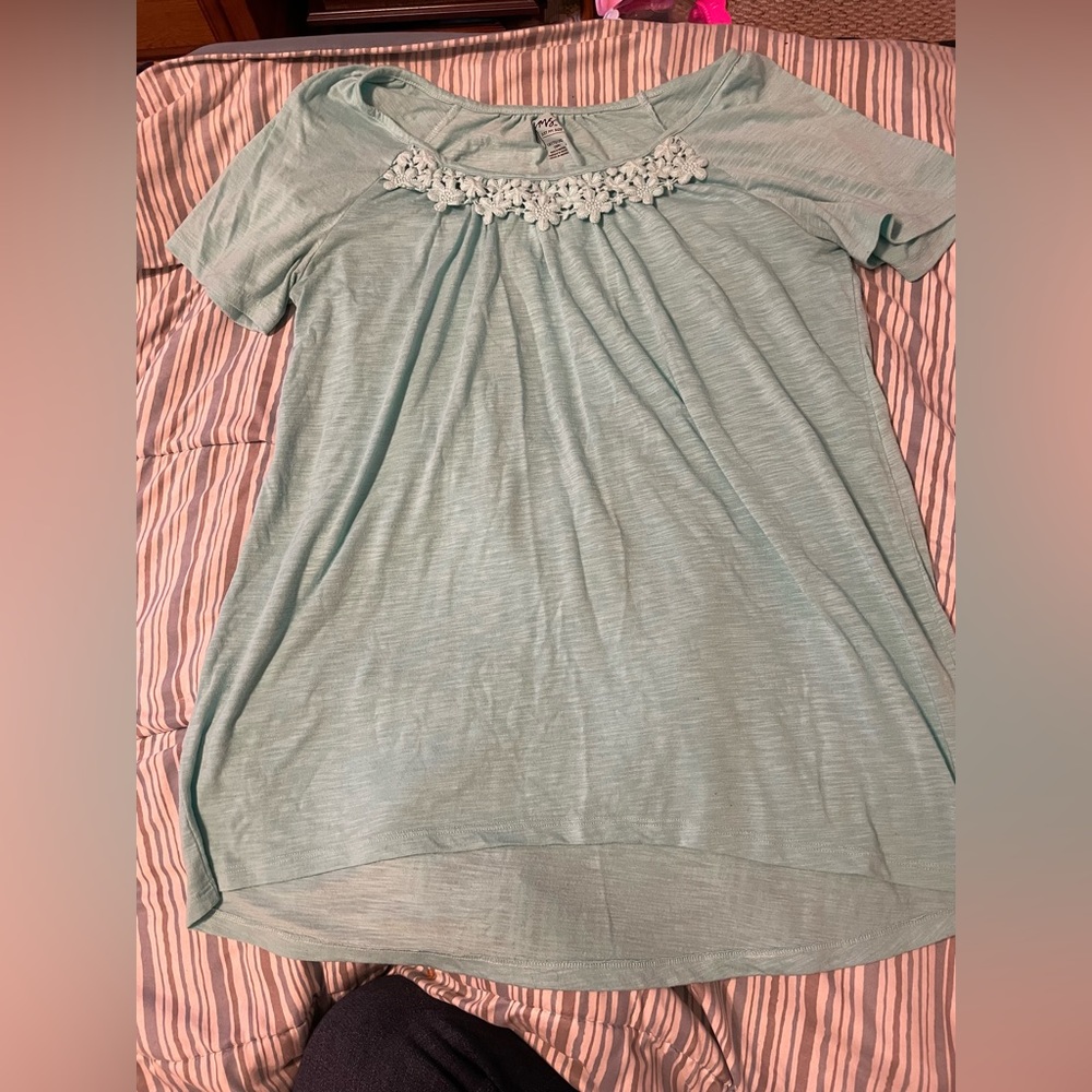 1x baby blue woman’s shirt